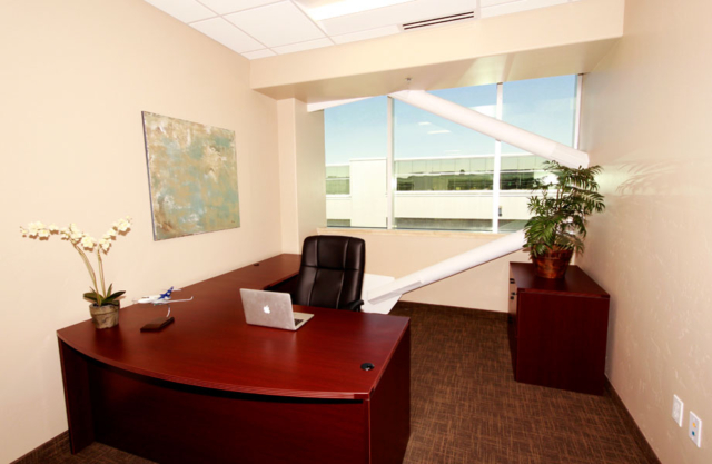 office with a view of the Palomar Airport in Carlsbad, CA